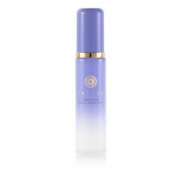 Tatcha Luminous Dewy Skin Mist in lavender plastic bottle on white background 