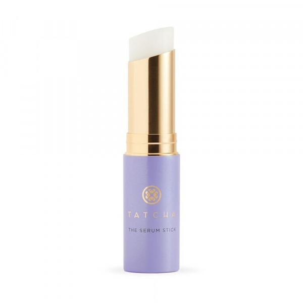 Tatcha The Serum Stick in lavender purple and gold on white background 